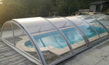 A fully assembled swimming pool enclosure