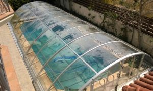 A fully installed swimming pool enclosure