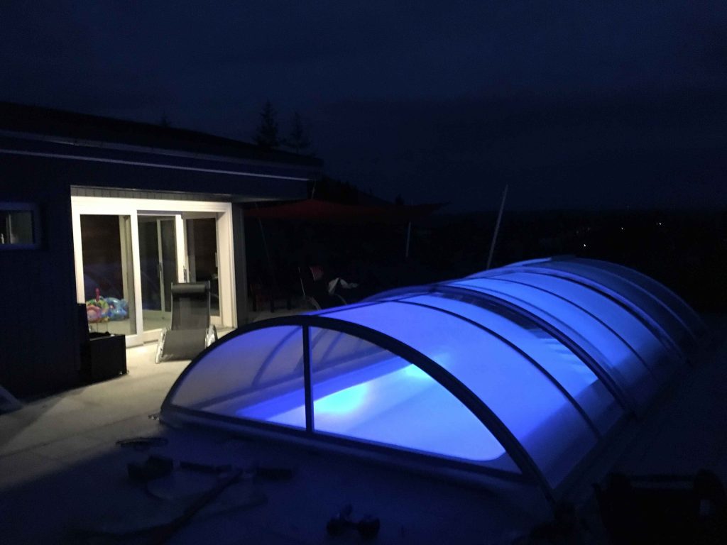 A fully installed swimming pool enclosure