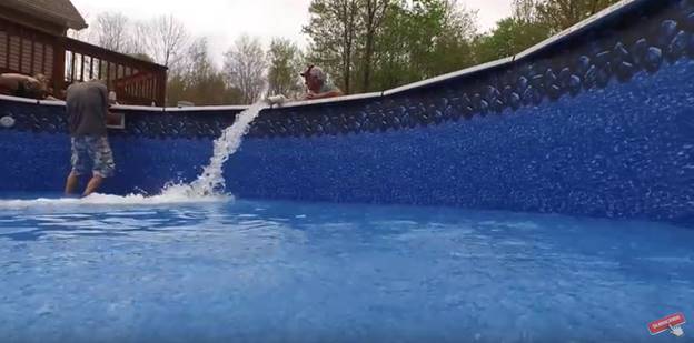 Filling the pool with water