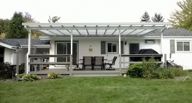 Sloping roof patio enclosure