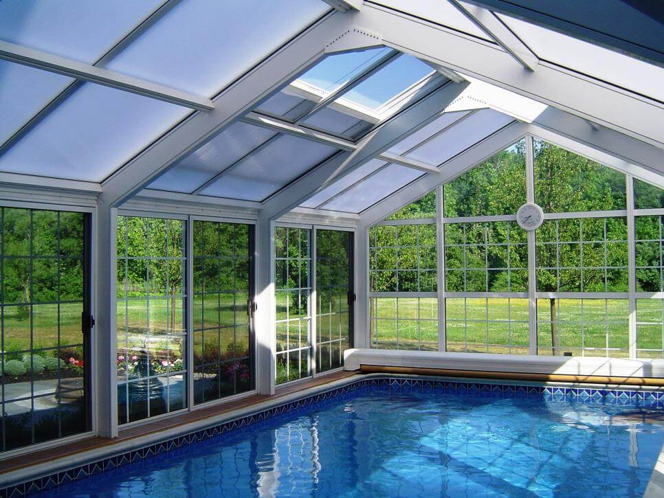 Glass swimming pool enclosure