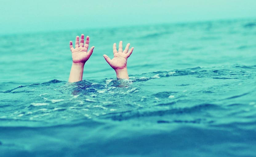 Kid drowning in swimming pool