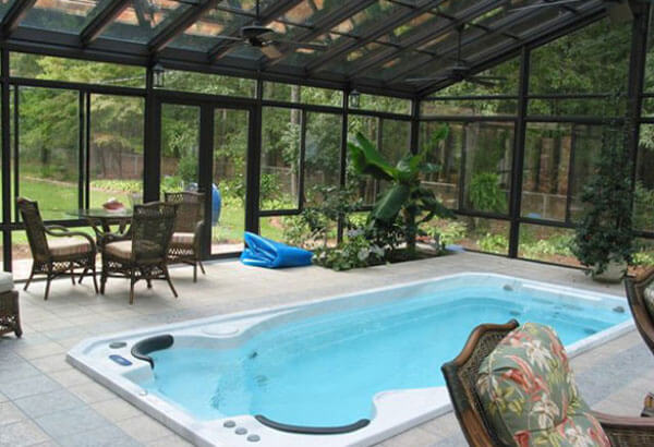 Sunroom with a pool
